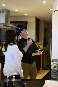 Home inspector in Kingston Ontario reviewing a property with a buyer | Century 21 Lanthorn Real Estate Ltd.