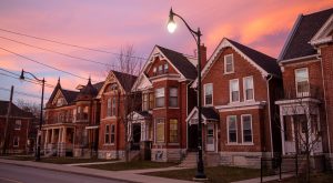 Red brick student housing in Kingston’s University District at sunset