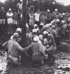 Engineering frosh entering the grease pole pit, 1975