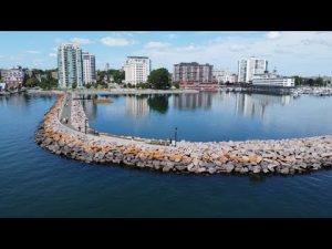 Kingston waterfront skyline with breakwater and Confederation Basin marina for power and sailboats
