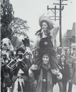 Frosh and upper-years parading along Union Street on the way to Richardson Stadium, 1976. The Oil Thigh chants and brass band echoed off the houses