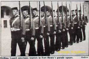 Members of the Fort Henry Guard in 19th-century military uniforms drilling with rifles on the parade square at Fort Henry in Kingston, Ontario, 1984