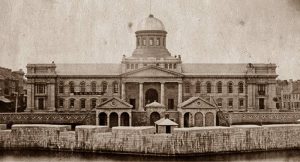 Historic photograph of the Market Battery with Kingston City Hall in the background.