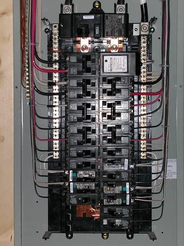 Modern 200 amp electrical service panel showing circuit breakers and household electrical distribution.