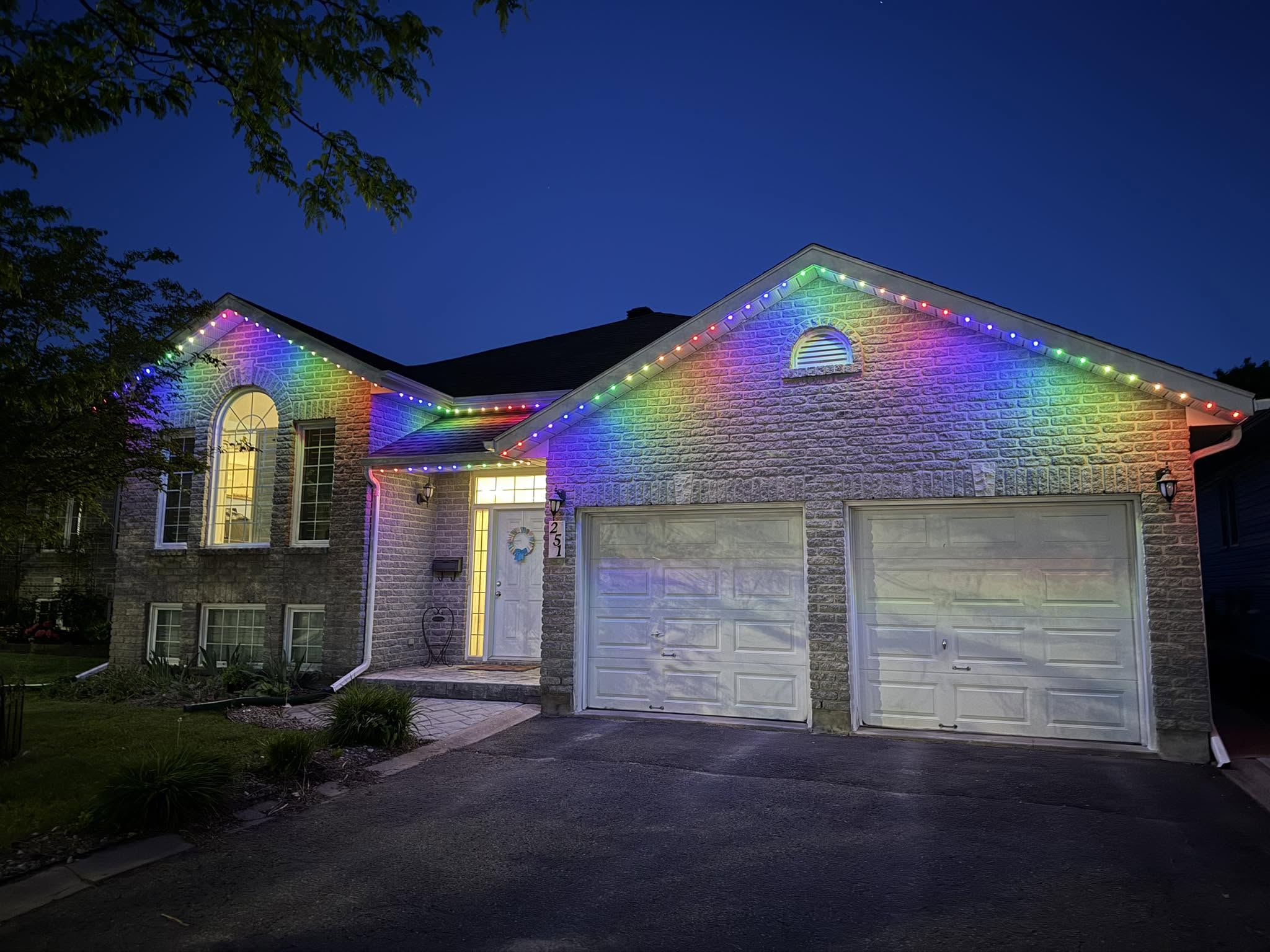 Permanent exterior LED lighting installed along the roofline of a Kingston area home can enhance curb appeal