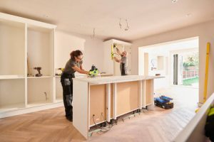 Modern kitchen renovations in Kingston home – stylish cabinetry and lighting upgrades