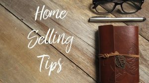 Notebook, glasses, and pen with text Home Selling Tips for Kingston real estate