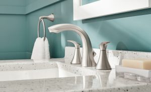 Brushed nickel bathroom faucet upgrade on a small bathroom vanity