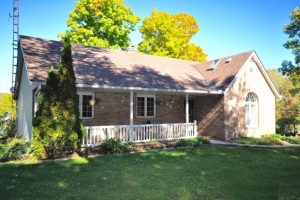 Curb appeal in Kingston Ontario home exterior in spring, Bill Stevenson, REALTOR®, Century 21 Lanthorn Real Estate Ltd., Brokerage