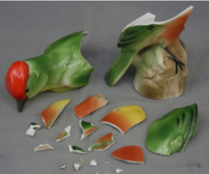 Broken decorative figurine showing why fragile items should be packed away when preparing your home for sale