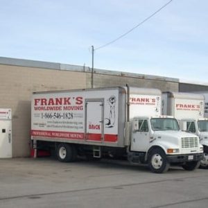 Relocating here? Frank’s Worldwide Moving truck at the Kingston warehouse, representing a local moving company option