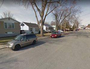 Residential street scene on Fourth Avenue in Kingston, showing mature trees and established neighbourhood character. Bill Stevenson, REALTOR, Century 21 Lanthorn Real Estate Ltd., Brokerage
