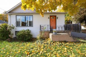 Small starter home with autumn leaves in the Kingston area, suitable as a first home, represented by Bill Stevenson, REALTOR®, Century 21 Lanthorn Real Estate Ltd., Brokerage.