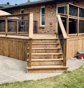 Wood deck with railing and stairs designed for outdoor entertaining in Kingston. Bill Stevenson REALTOR, Century 21 Lanthorn Real Estate Ltd Brokerage.