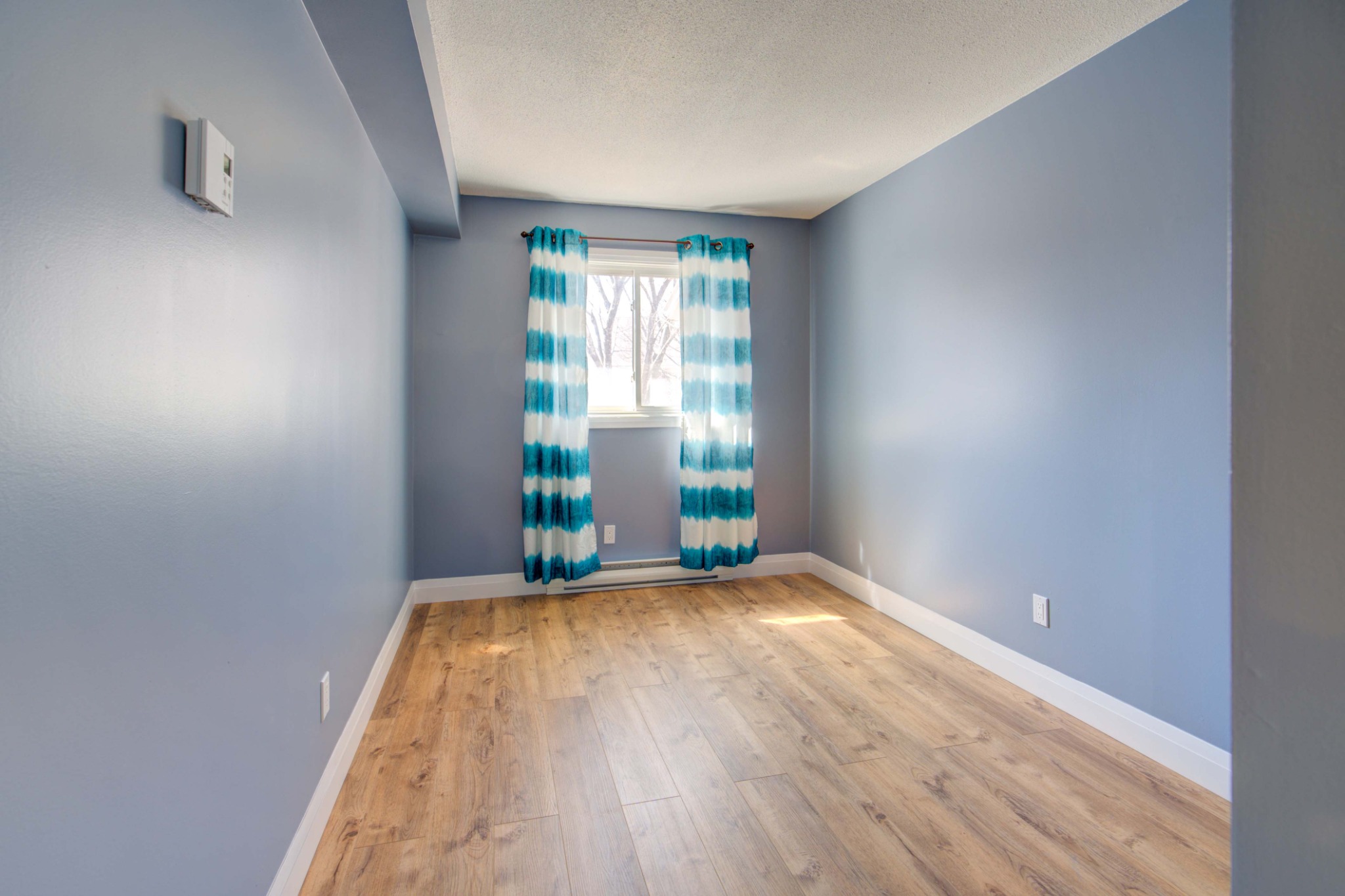 Empty bedroom with natural light at closing, Kingston Ontario, Bill Stevenson, REALTOR®, Century 21 Lanthorn Real Estate Ltd., Brokerage