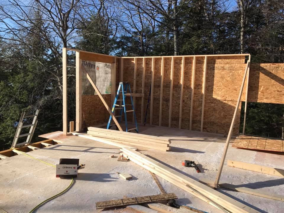 home construction framing stage vacant land Ontario slab foundation rural build
