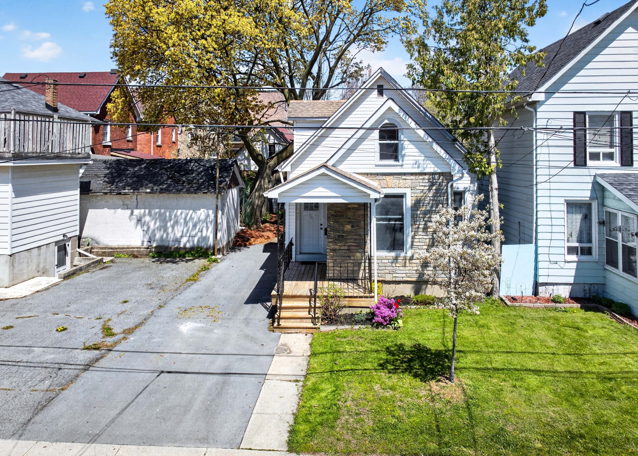 Front exterior of 23 Jenkins Street, an updated 4-bedroom home in Kingston’s Williamsville neighbourhood near Queen’s University and KGH