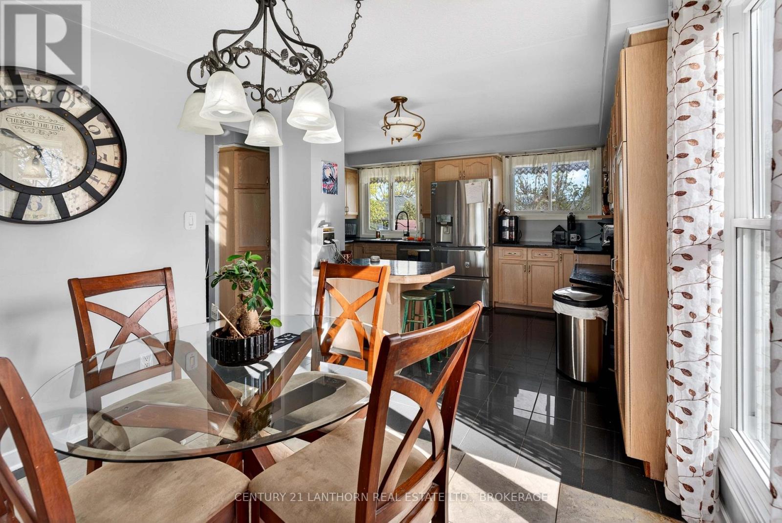 Bright dining area connected to the kitchen in Amherstview side-split family home