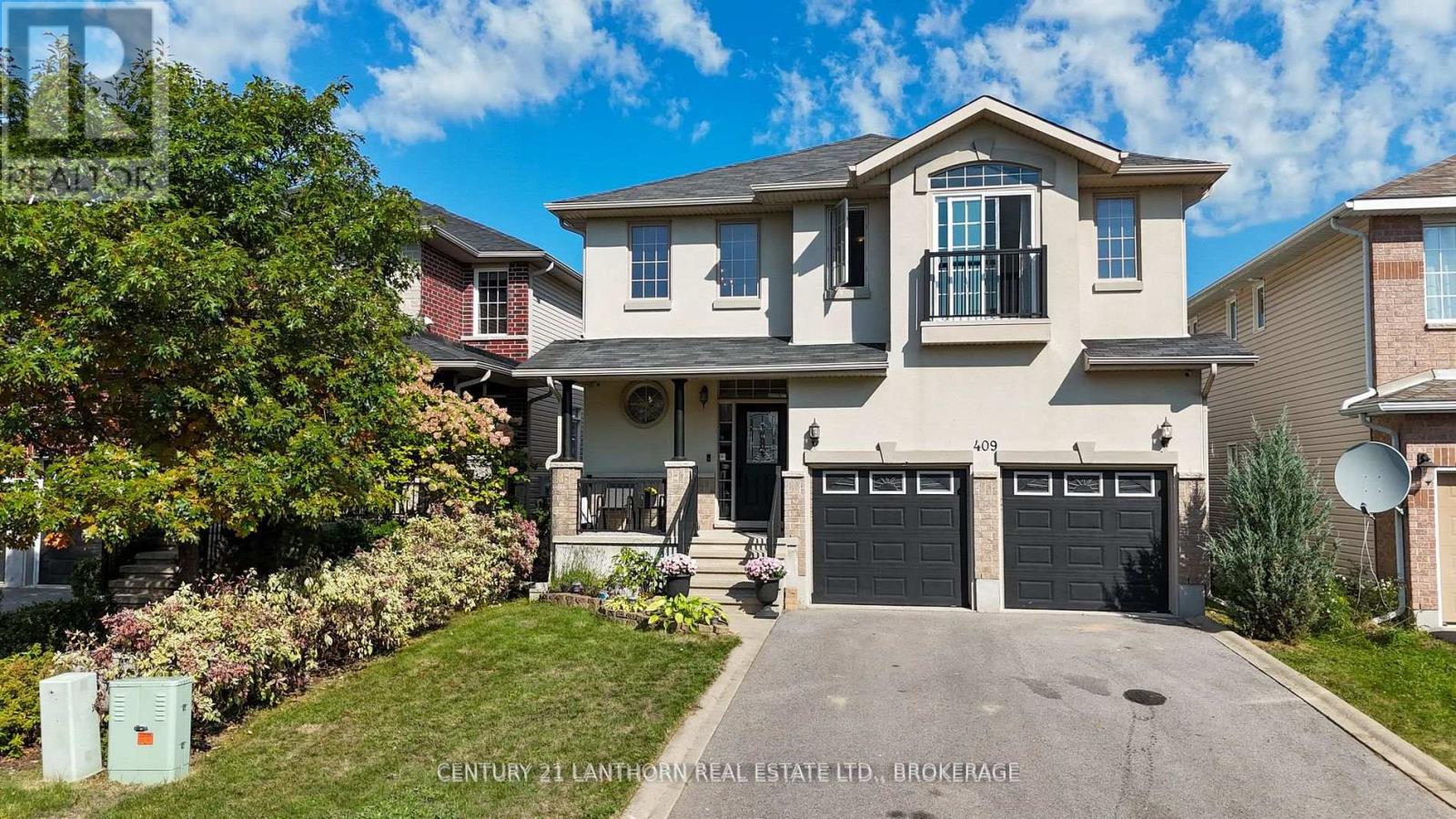 Two-storey luxury family home in Kingston’s King’s Landing neighbourhood with updated exterior and double garage