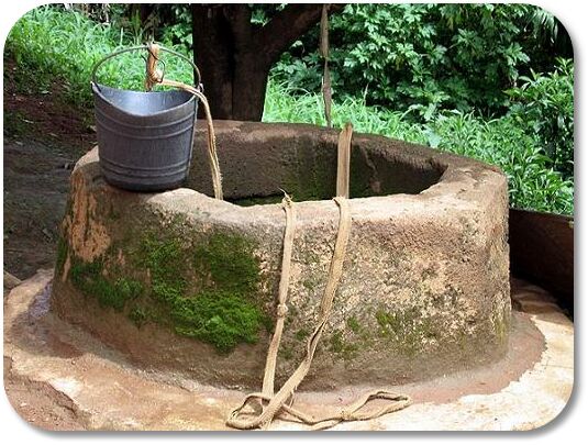 traditional stone dug well illustrating how many people picture a private dug well