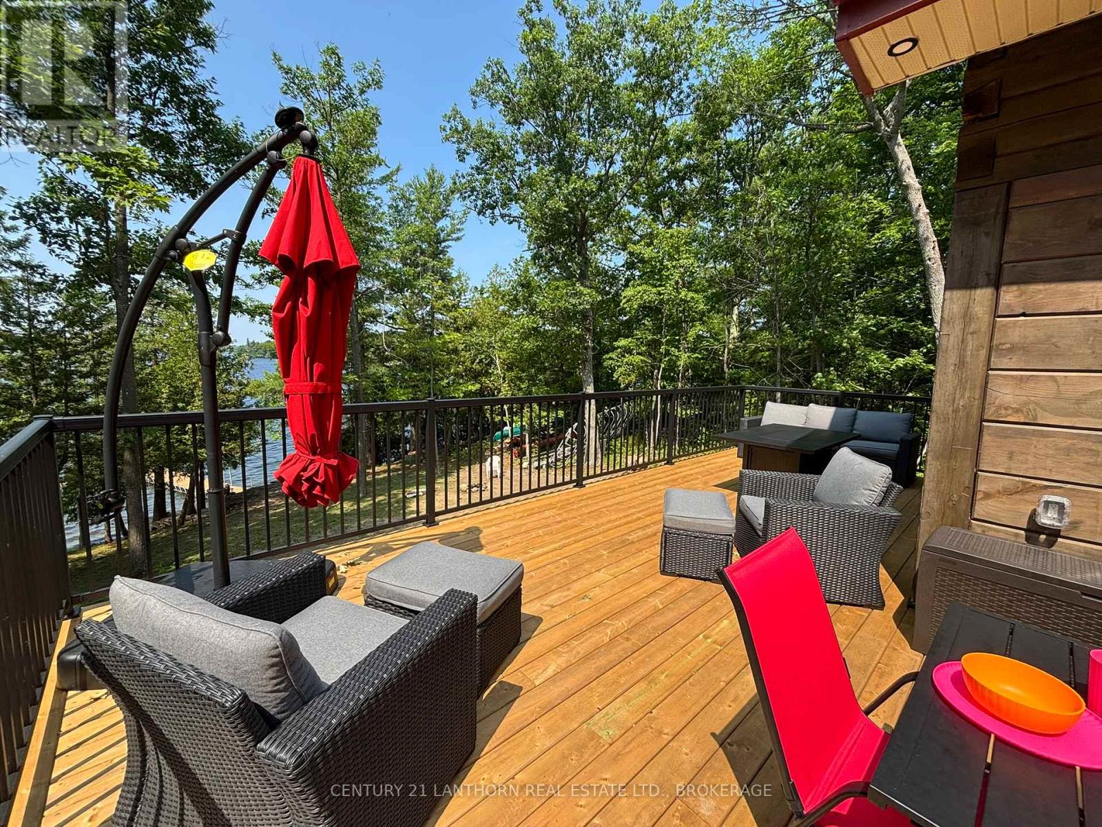 Kingston area homes $900K-$1.5M featuring a waterfront deck and outdoor living space