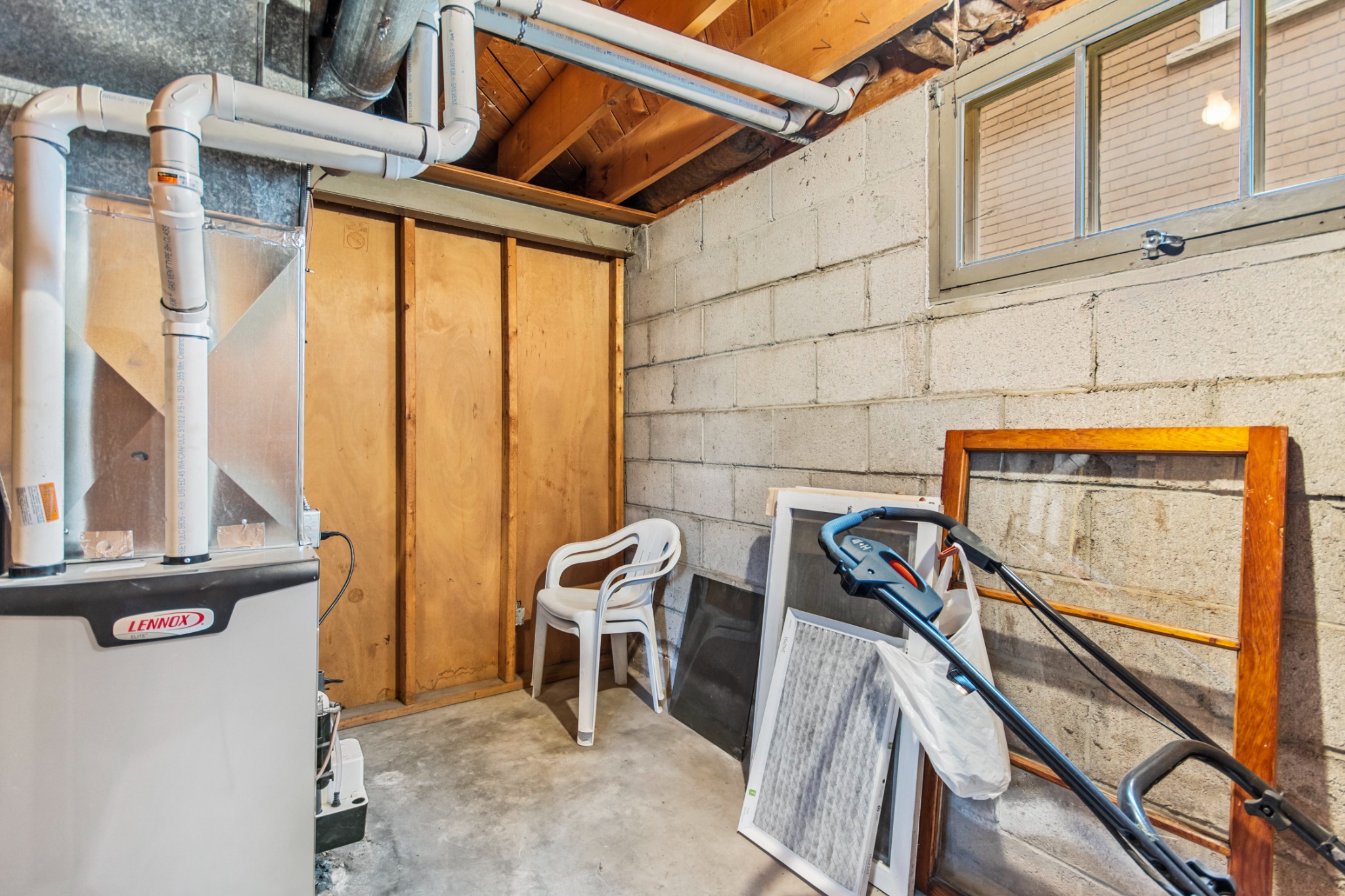Unfinished basement in a home being sold as is during home sale negotiations