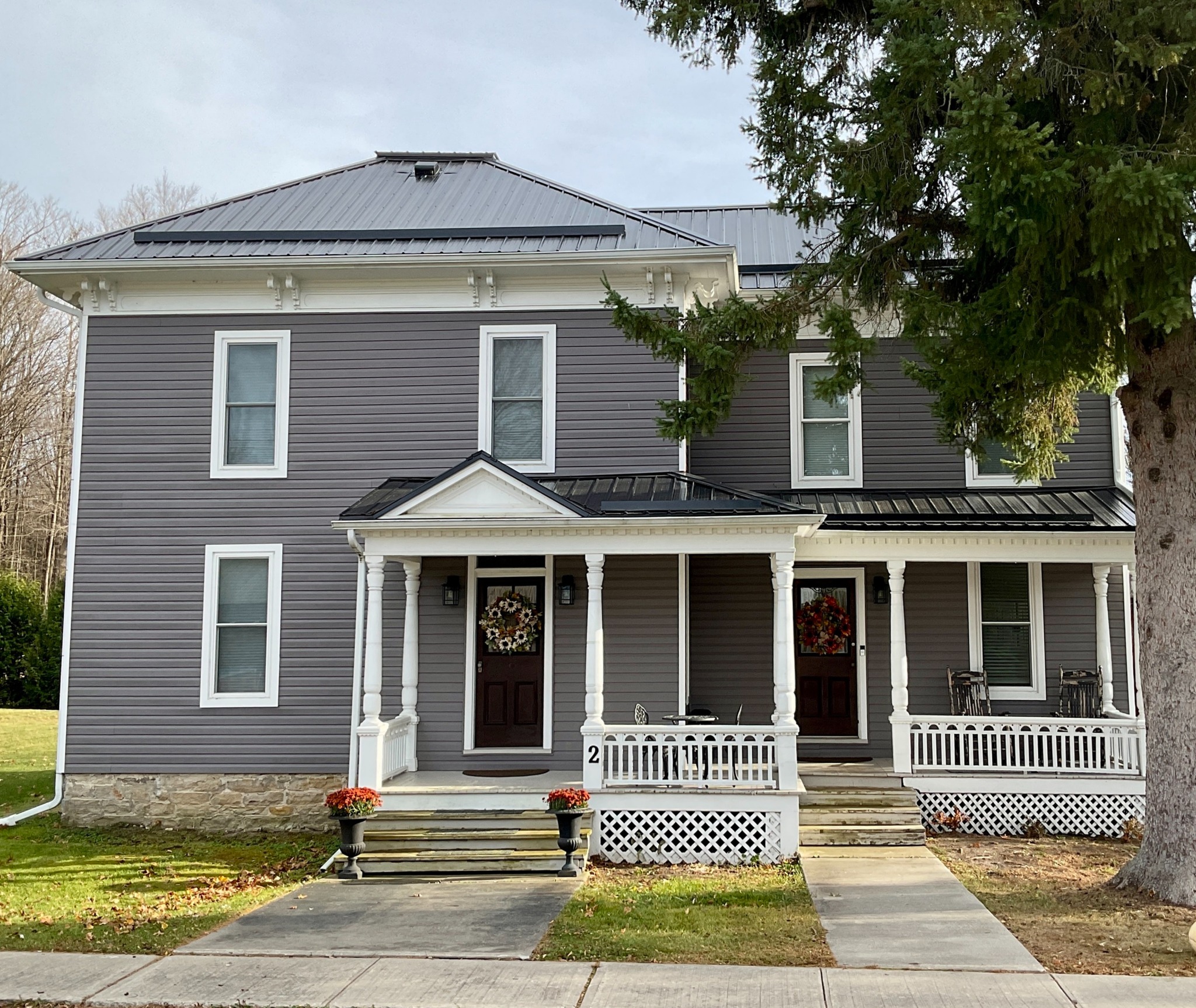 Front exterior of the restored century home at 2 John Street in Delta, Ontario