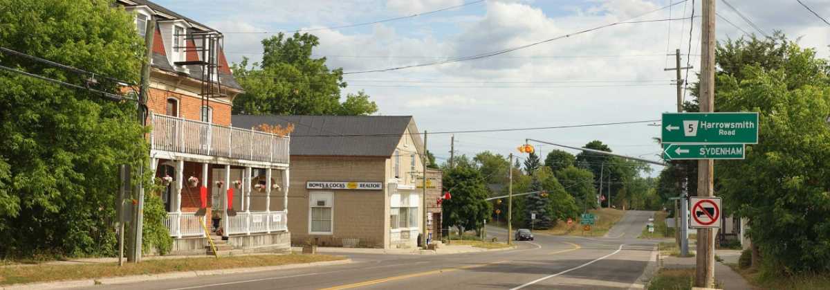 Moving to a small town near Kingston, streetscape in Harrowsmith Ontario showing local businesses, village character, and community amenities. Bill Stevenson, REALTOR®, Century 21 Lanthorn Real Estate Ltd., Brokerage.