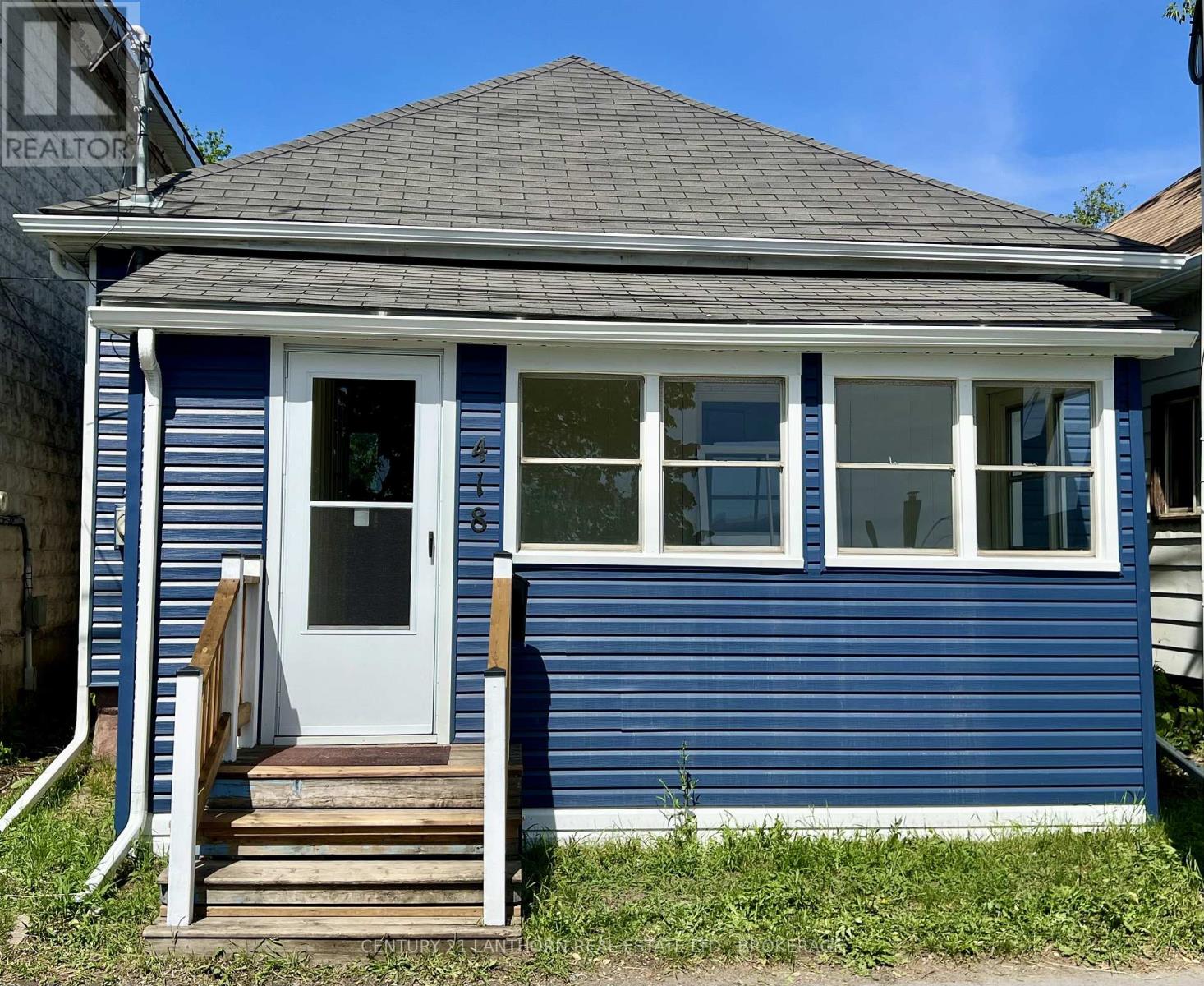 Affordable detached home for sale at 418 Montreal Street in Kingston with updated exterior and renovated interior