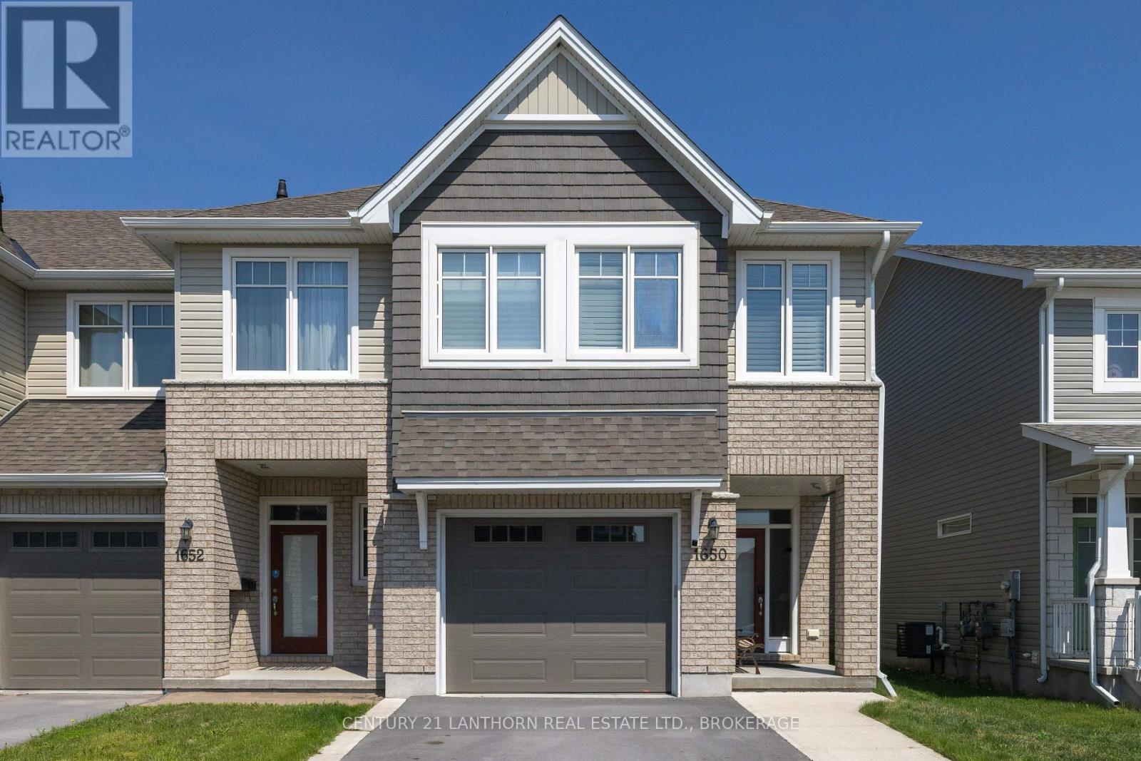 End-unit townhouse at 1650 Tenley Drive in Kingston