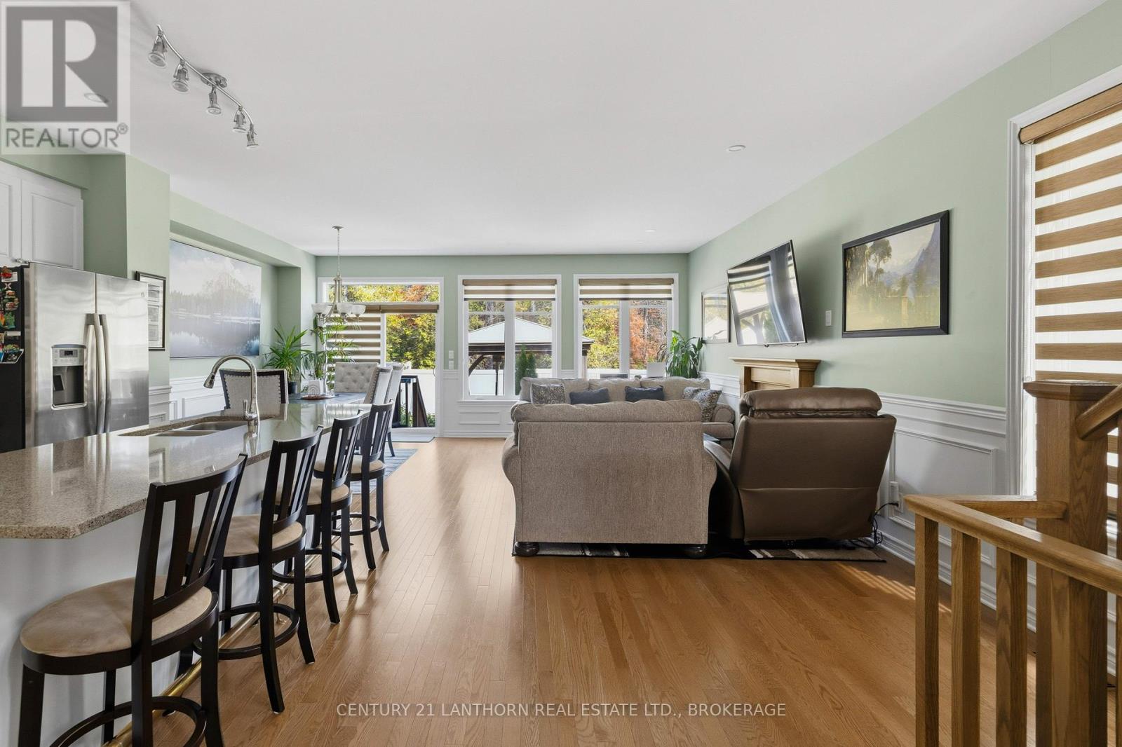 Open concept kitchen, dining and living area in townhouse at 1650 Tenley Drive, Kingston