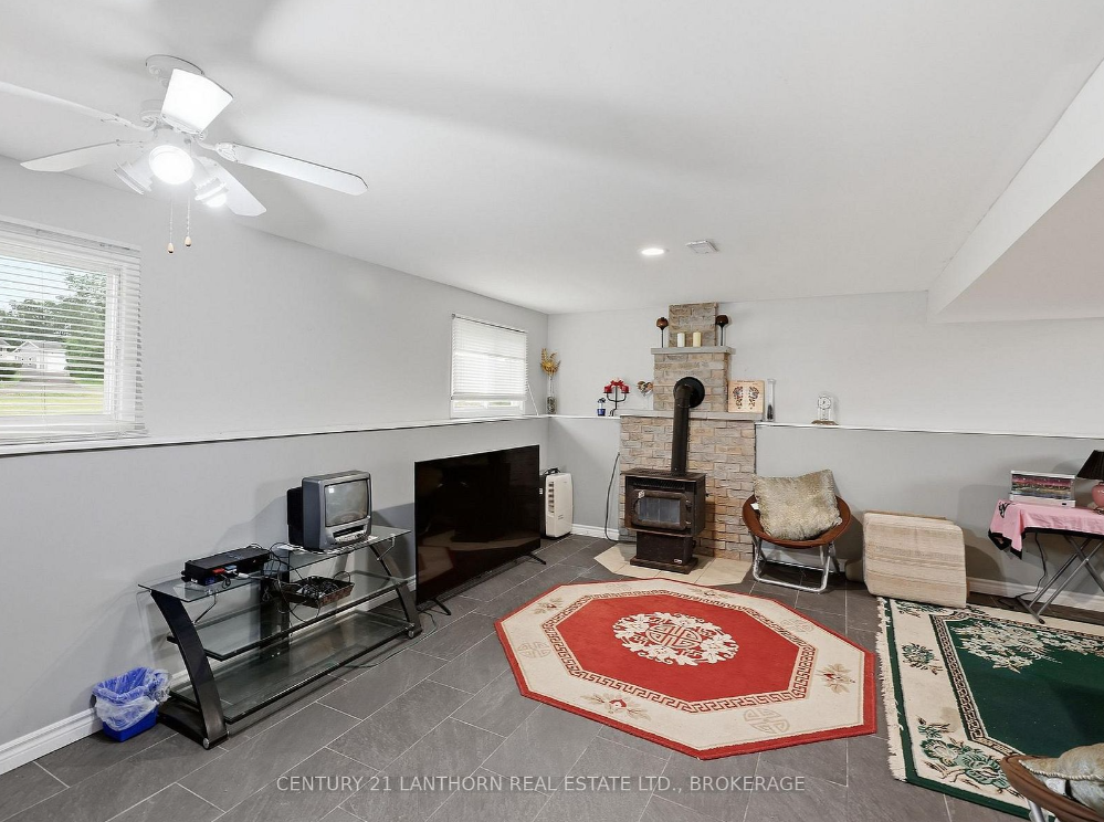 Finished recreation room with wood stove in a four-bedroom bungalow near Sydenham