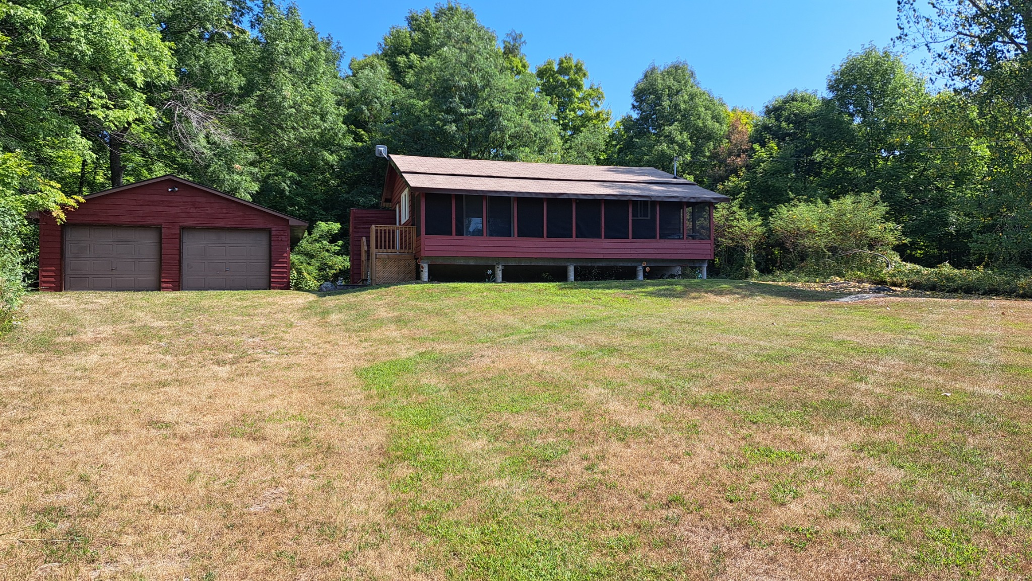 Detached garage and rural home related to rural property insurance in Frontenac and area