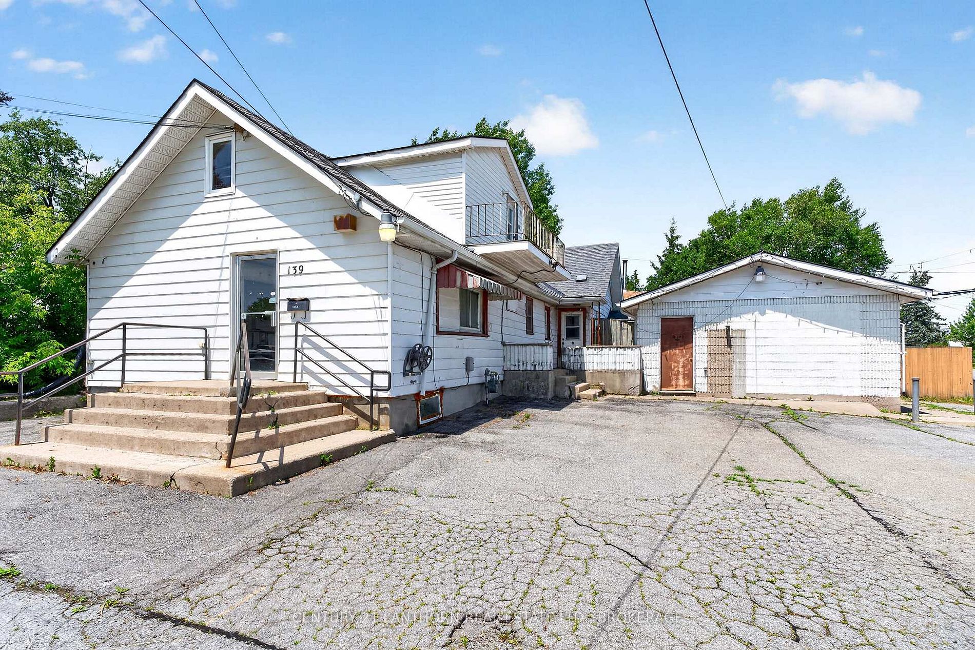 Property with detached building featured in the June housing market update for Kingston and area