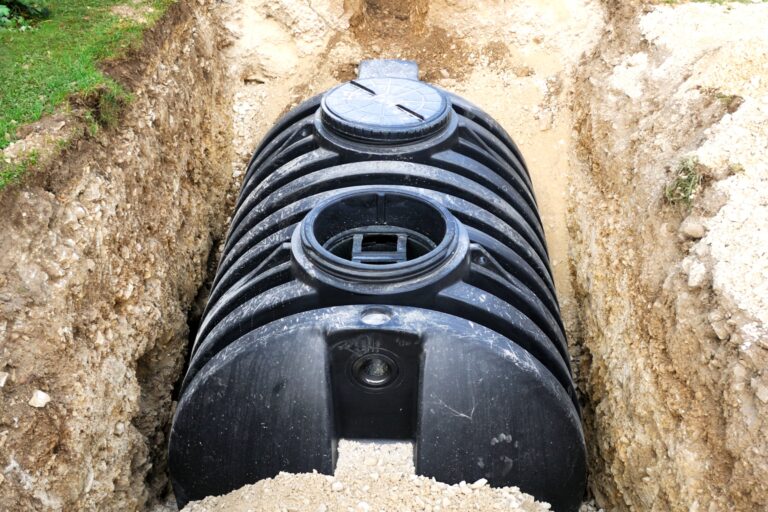 Septic tank installation at a rural property, showing a private sewage system that can affect rural financing.