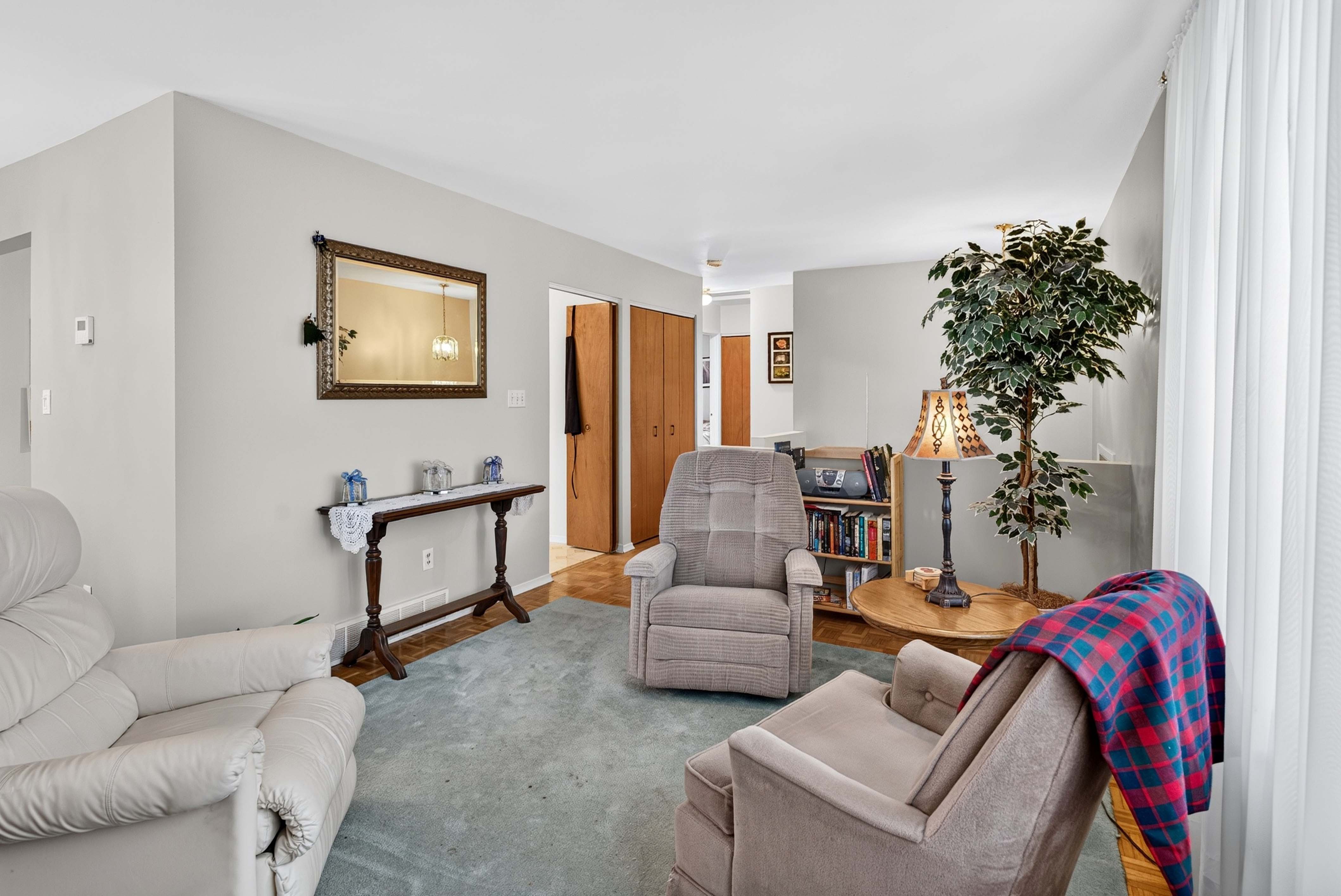 Living room at 742 Laidlaw Crescent Kingston with parquet flooring and large front window